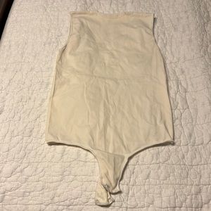 SKIMs cream colored body suit. S/M. High neckline